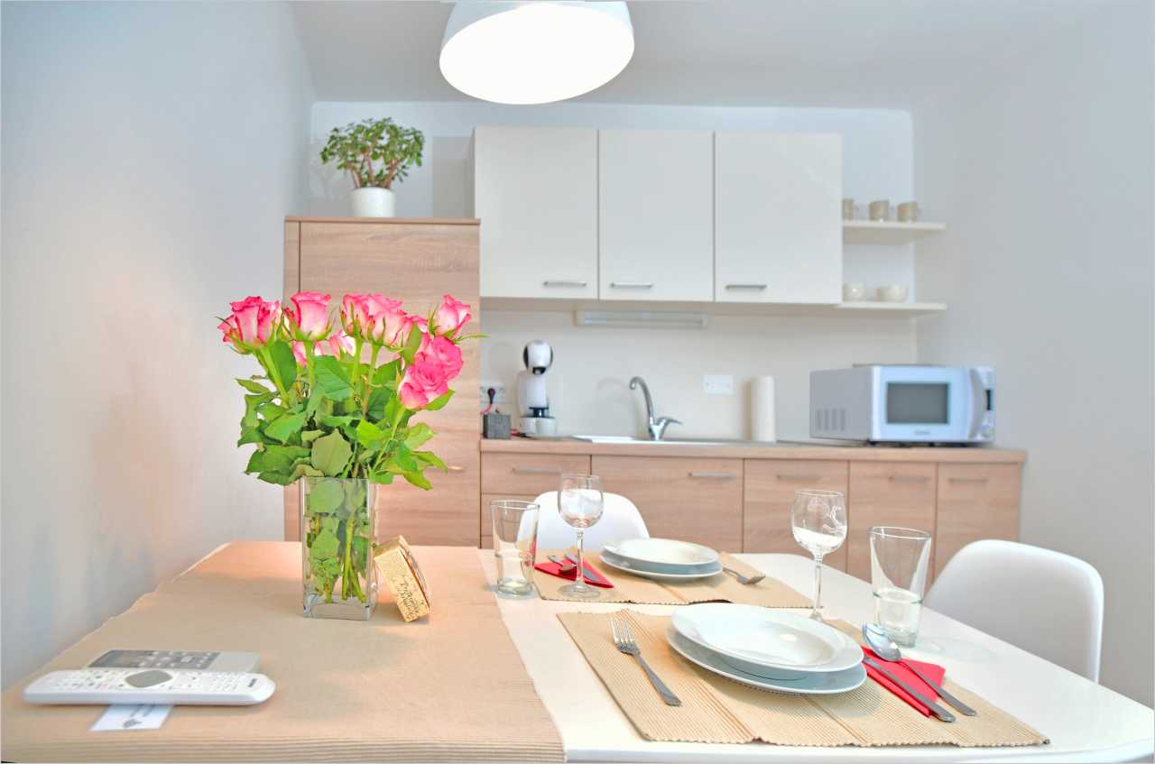 Apartment Ljubljana Sweet Stay - kitchen with dining table